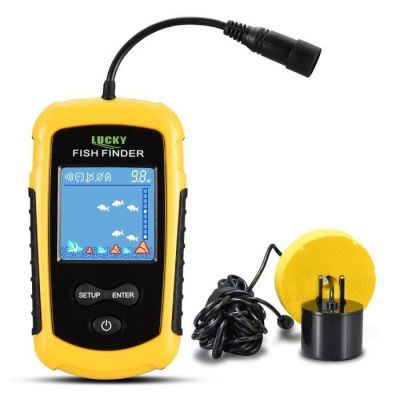 un gros plan sur un sondeur jaune à côté d'un chargeur