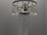 a lamp that is sitting on a table in a room
