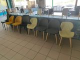 a lot of chairs that are lined up in a row