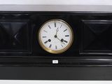 a clock that is sitting on top of a table