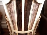 a chair that is sitting in the corner of a room