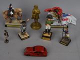 many figurines of different types and sizes on display