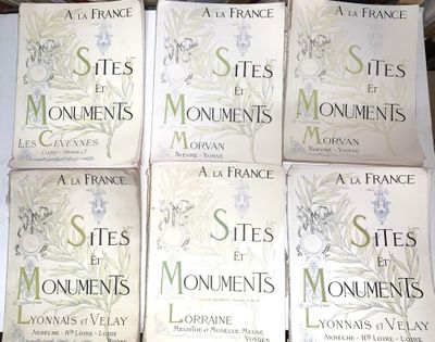 six livres posés sur une table, dont plusieurs empilés les uns sur les autres
