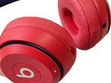 a pair of headphones that are red and blue