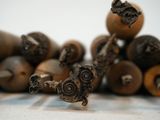 a lot of wooden objects that are sitting on a table