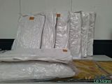 a pile of plastic bags sitting on top of a table