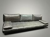 an image of a couch with pillows on it