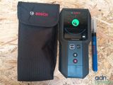 a black case with a cell phone and a pen in it