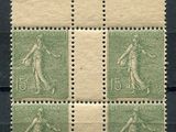 a stamp with four different images of a woman on it