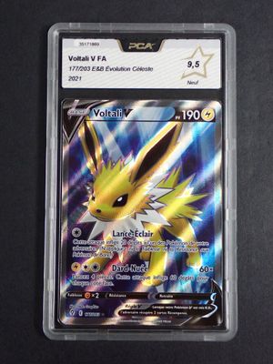 a close up of a pokemon card on a black surface