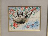 tableau représentant deux oiseaux dans un nid, sur une branche d'un arbre en fleurs