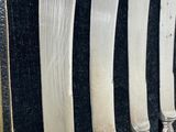five knives that are lined up in a row