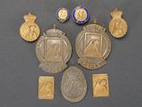 some of the medals and medals are on display on the table