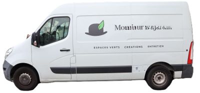 the van is white with black trims and a logo on the side