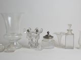 a lot of glass items that are sitting on a table