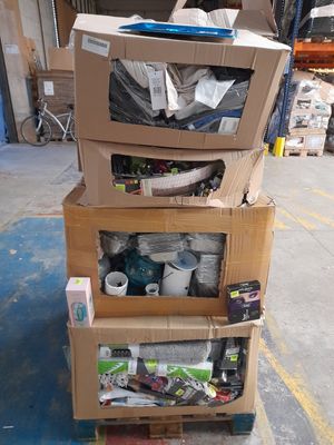 many boxes stacked on top of each other in a warehouse