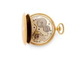 an image of a pocket watch with a gold case on a white background