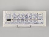 a close up of a toothbrush holder with a picture on it