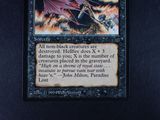 a close up of a card with a picture of a dragon on it