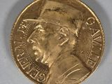 an image of a gold coin with a man ' s face on it