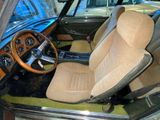 a car that is sitting in a car showroom