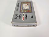 a box of cigarettes sitting on a white surface