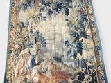 an image of a tapestry hanging on the wall of a room