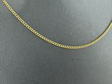 a gold chain necklace on a mannequin mannequin mannequin mannequin mannequin mannequin mannequin mannequin manne