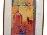 framed painting of a yellow and red abstract painting in a white frame
