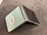 an open laptop computer sitting on top of a table