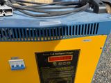 a blue and yellow box with wires attached to it
