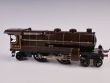 un petit train sur une surface blanche avec un fond blanc