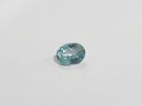 a blue diamond on a white surface