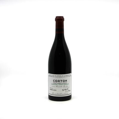a bottle of wine that is sitting on a table