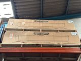 several boxes are stacked on top of each other in a warehouse