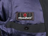 a close up of a man ' s jacket with a logo on it