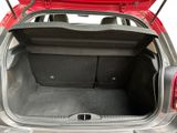 a trunk of a car with the back door open