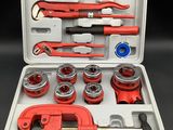 an image of a tool kit with a wren and other tools