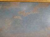 une image d'un tableau sur le mur d'une pièce