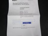 a receipt with a picture of a person holding a cell phone