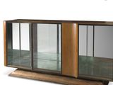 a close up of a glass display case with a wooden base