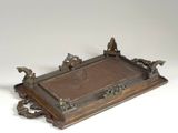 an image of a wooden tray with a horse design on it
