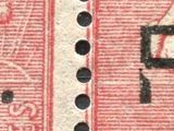 a close up of a stamp with a woman on it