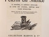 an old book with a black and white drawing of a jar on top of a book