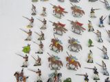 a lot of figurines that are on a table