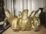 a glass vase that is sitting on a table