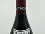 a bottle of wine that is sitting on a table