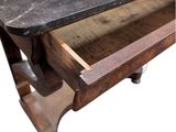 a marble top table with a drawer underneath it