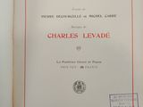 the front cover of a book with a red border on it