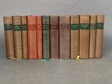 a set of five books sitting on top of each other